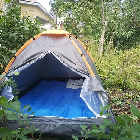 Valkea Monitoimitila - Teltta Vaneeripohjalla